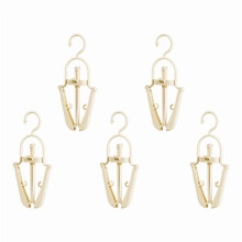 Cintre pliable, accessoire de buanderie peu encombrant