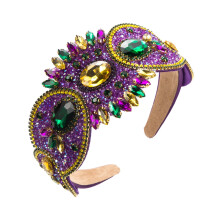 Luxe, sprankelende haarband voor dames met kristallen strass-steentjes en een sponsachtige afwerking. Elegant accessoire voor avondgelegenheden in