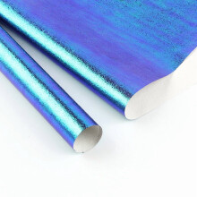 10 hojas de papel de regalo brillante con purpurina de 50x70 cm.