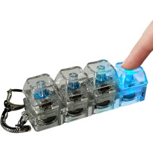 Fidget-tastaturleke med 4 klikkbare taster og fargerike lys