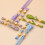 Handgenaaide Cheongsam met bloemknopen als decoratieve sluiting12 6