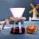 Cafetera de vidrio con filtro reutilizable y 5