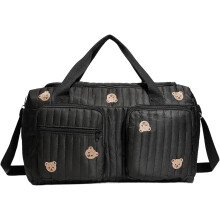 Bolsa de fraldas acolchoada em algodão com alças ajustáveis.