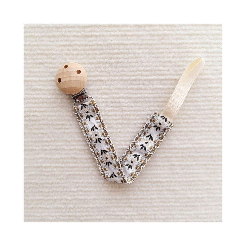 Embroidered baby pacifier clip with beech wood teether