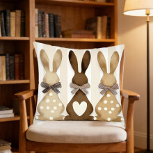 Housse de coussin décorative 45 x 45 cm « Joyeuses Pâques » avec lapin, idéale pour décorer un canapé ou un fauteuil au printemps.