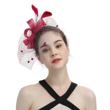 Chapeau haut-de-forme à nœud pour femme, bibi en résille délicate, élégance classique pour les goûters et les mariages.