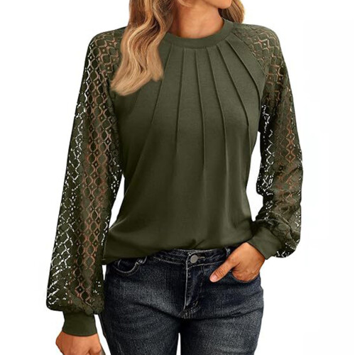 Dameblonbluse i polyester med lange ermer og rund hals