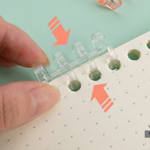 Plastic binding strip with 4 holes for notebooks and 1