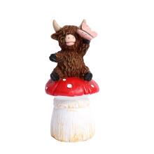 Multifunctional Resin Highlands Cow-Cow sitting on mushr