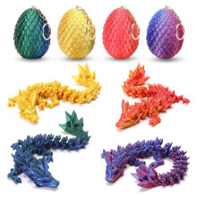 4 uova di drago stampate in 3D con drago all'interno