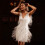 Abito flapper da donna anni '20 con frange e nappe decorate con perline. 7