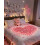 Sett med rosa kunstige roseblader og LED-telys4050 5