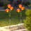 3 LED Solar-Gartenstecker in Löwenzahnform, rot 1