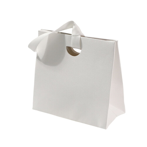 Sac cadeau texturé rouge de qualité supérieure avec poignée
