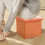 Orange Foldable Fabric Stool For Storage Needs With Compact Fold And Stylish Appearance 4