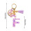 Porte-clés initial pour femme avec pompon violet 3