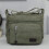 Men's green canvas shoulder bag with multiple pockets 1