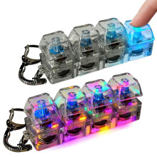 2 stuks verstelbare drukspeeltjes voor toetsenbord – 4 toetsen, transparant zwart met kleurverlichting, verlichte sleutelhanger voor