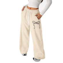 Calça infantil feminina com laço e cordão, modelagem solta e leve para crianças de 6 a 7 anos, bege Z01 – Ideal para escola e brincadeiras.