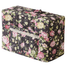 Funda para máquina de coser de estilo bohemio con estampado floral y acolchada con bolsillos.