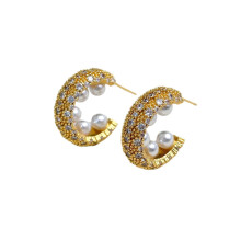 Women's C-shaped pearl earrings, gold-plated, set with large round open pearls and cubic zirconia, make a perfect birthday gift choice.