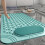 Alfombrilla de ducha rectangular antideslizante de PVC con estampado de lunares. 2