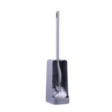 Set composto da scopino per WC con setole dure e supporto a parete.