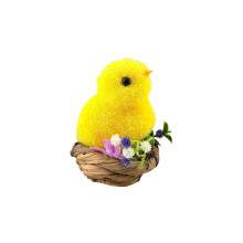 Cestino di Pasqua in paglia con decorazione a forma di pulcino giallo in resina.