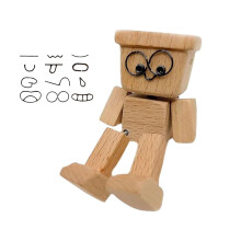 Schüttelfigur aus Holz mit magnetischen Gesichtsausdrücken