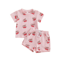 (18-24 Months, Pink) Conjunto de dos piezas para bebé niña: top de manga corta con estampado de cerezas y lazo, y shorts.