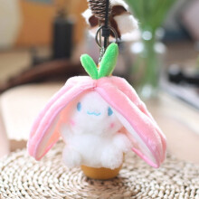 Kawaii pluche konijntje met een wortel en een aardbei.