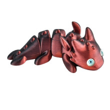 Figura de salamandra gigante impressa em 3D com múltiplas articulações e olhos móveis.