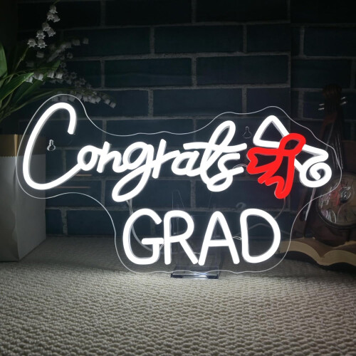 Συγχαρητήρια για την επιγραφή "Grand Grad Neon" με διακοσμητικά σε σχήμα κύλισης για την