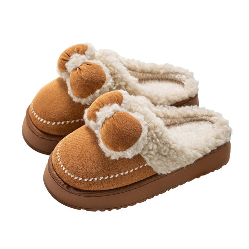 Comode pantofole invernali con fiocco e design, calde e foderate in pile, ideali per interni ed esterni. 1