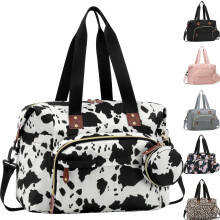 Bolsa para fraldas com estampa de vaca, tamanho médio.
