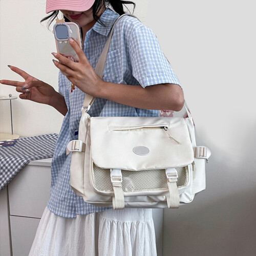 Borsa a tracolla capiente per studenti, semplice e versatile.