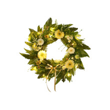 Kunstig blomsterkrans med bregneblade og bånd