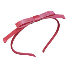 Diadema estilo Matilda color rojo rosa con lazo, fabricada en el Reino Unido.