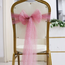 Coprisedia floreale in pizzo con nastri decorativi per matrimoni e feste.