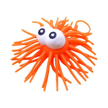 Balle souple élastique phosphorescente avec yeux en relief, couleur aléatoire, idéale comme petit cadeau ou pour compléter une fête d'enfants ou