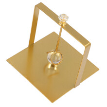 Elegant Golden Napkin Dispenser with Glass Ball