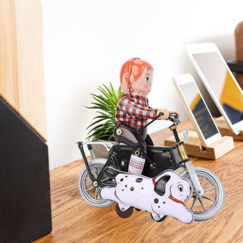 Retro Clockwork Toy: Boy on Bike with Dog