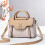 Borsa da donna con molteplici tasche interne, modello a tracolla 1
