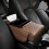 Organizer 5 in 1 in similpelle per bracciolo auto con portabicchieri 1