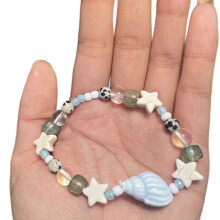 Keramische armband met schelp en ster in blauwgroen