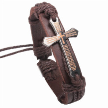 Pulsera ajustable de cuero con cruz, chapada en plata y color marrón.