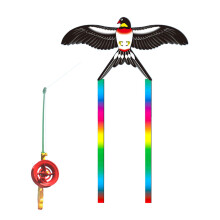 Cometa dinámica con forma de golondrina y sedal para niños.