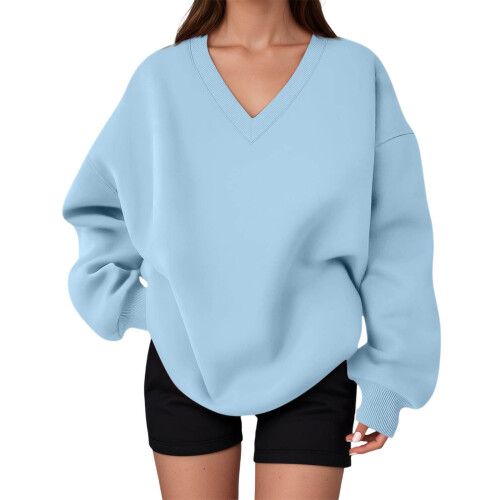 Blusa de moletom feminina oversized com decote em V, manga longa e cor sólida.