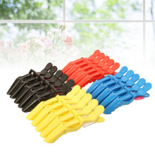 Lot de 20 pinces à cheveux de salon multicolores en plastique, de type crocodile, pour une tenue ferme et une utilisation optimale.
