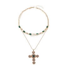 Gouden kruishangerketting voor dames met zirkoon